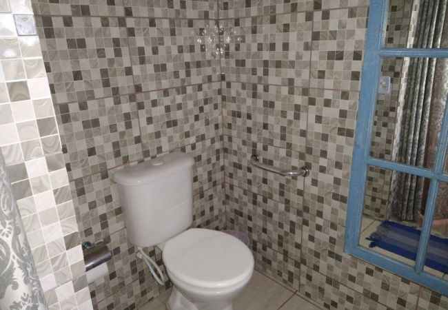 Quarto em Caraguatatuba - Suíte 4 para PcD com piscina em Caraguatatuba Quarto em Caraguatatuba - Suíte 4 para PcD com piscina em Caraguatatuba