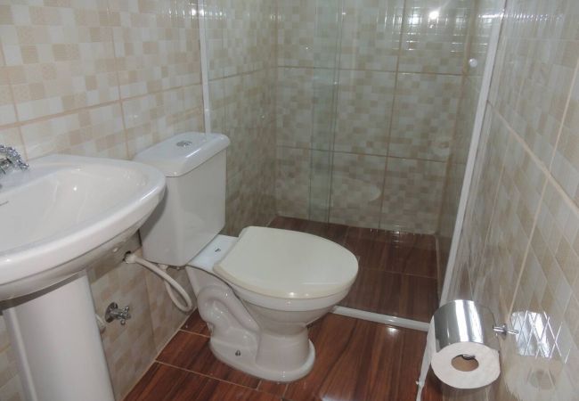 Quarto em Caraguatatuba - Suíte 5 com piscina e wi-fi em Caraguatatuba Quarto em Caraguatatuba - Suíte 5 com piscina e wi-fi em Caraguatatuba