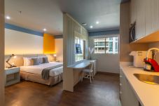 Quarto em Rio de Janeiro - Suíte, piscina e academia | BPremium T5 