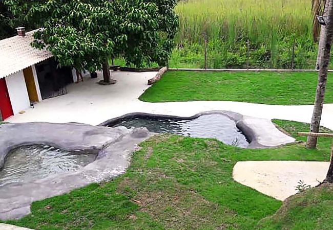 Apartamento em Guarapari - Suíte em Pousada c piscina e natureza em Meaípe/ES Apartamento em Guarapari - Suíte em Pousada c piscina e natureza em Meaípe/ES