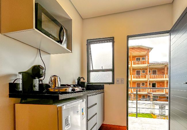 Apartamento em Bertioga - Incrível flat a beira mar na Praia de Guaratuba/SP Apartamento em Bertioga - Incrível flat a beira mar na Praia de Guaratuba/SP