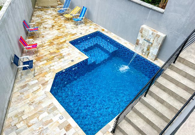 Apartamento em Bertioga - Incrível flat a beira mar na Praia de Guaratuba/SP Apartamento em Bertioga - Incrível flat a beira mar na Praia de Guaratuba/SP