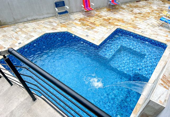 Apartamento em Bertioga - Incrível flat a beira mar na Praia de Guaratuba/SP Apartamento em Bertioga - Incrível flat a beira mar na Praia de Guaratuba/SP