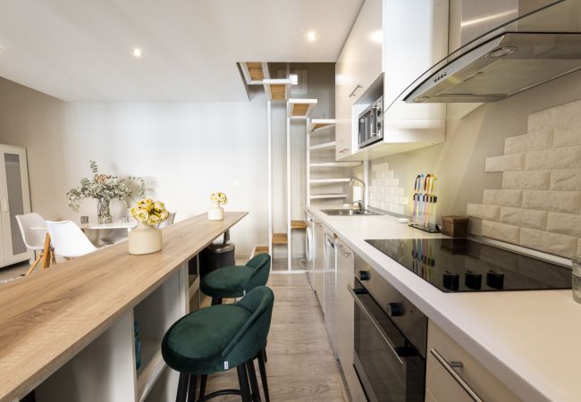 Apartamento em Madrid - Dúplex con encanto en Chamberí : Comodidad y diseño en dos niveles  Apartamento em Madrid - Dúplex con encanto en Chamberí : Comodidad y diseño en dos niveles