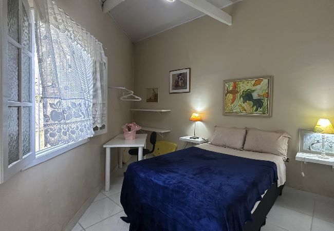 Casa em Caraguatatuba - Casa confortável, bem equipada com Wi-Fi e garagem Casa em Caraguatatuba - Casa confortável, bem equipada com Wi-Fi e garagem