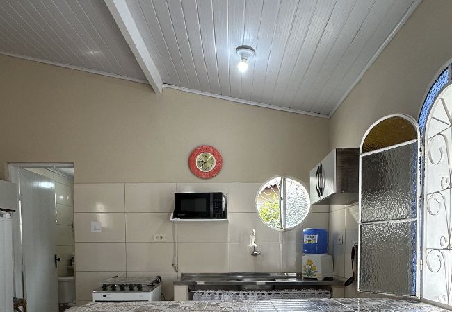 Casa em Caraguatatuba - Casa confortável, bem equipada com Wi-Fi e garagem Casa em Caraguatatuba - Casa confortável, bem equipada com Wi-Fi e garagem