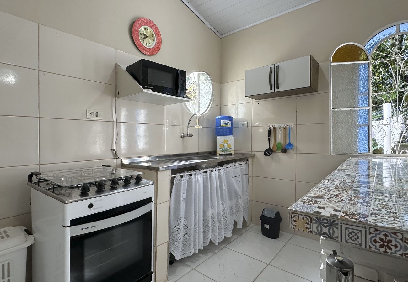 Casa em Caraguatatuba - Casa confortável, bem equipada com Wi-Fi e garagem Casa em Caraguatatuba - Casa confortável, bem equipada com Wi-Fi e garagem