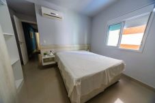 Apartamento em Guarujá - Apto pet friendly c/ churrasqueira a 100m da praia