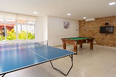 Apartamento em Guarujá - Apto c Piscina e Brinquedoteca a 400m da praia 