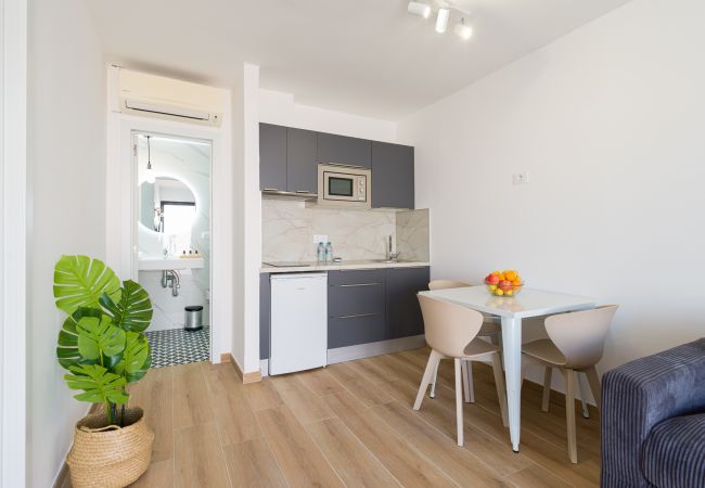 Apartment in Corralejo - Modern apartment. Swimming pool and terrace. Right on the beach in Corralejo - Home For Guest Apartment in Corralejo - Modern apartment. Swimming pool and terrace. Right on the beach in Corralejo - Home For Guest