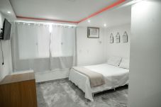 Rent by room in Rio de Janeiro - Suite in a Sea View Inn | PV-ST3