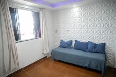 Rent by room in Rio de Janeiro - Suite in a guesthouse with a pool | PV-ST5