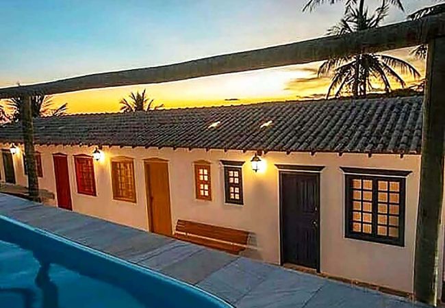 Apartamento en Guarapari - Suíte em Pousada c piscina e natureza em Meaípe/ES