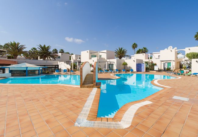 Apartamento en Corralejo - Moderno Apartamento. Piscina y terraza. A pie de playa en Corralejo -Home For Guest Apartamento en Corralejo - Moderno Apartamento. Piscina y terraza. A pie de playa en Corralejo -Home For Guest