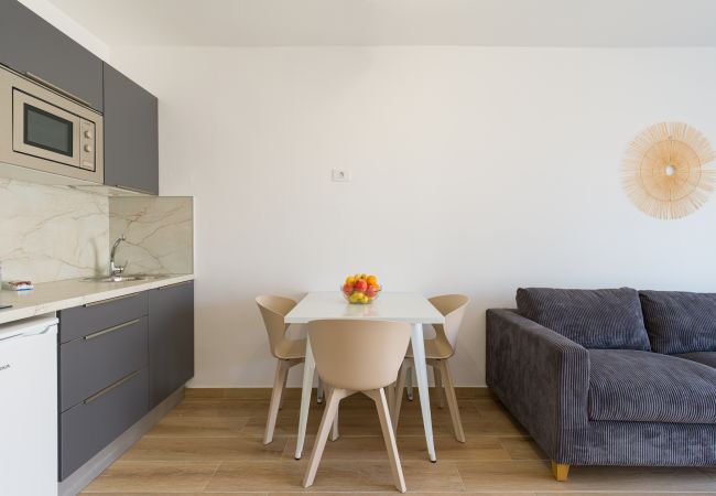 Apartamento en Corralejo - Moderno Apartamento. Piscina y terraza. A pie de playa en Corralejo -Home For Guest Apartamento en Corralejo - Moderno Apartamento. Piscina y terraza. A pie de playa en Corralejo -Home For Guest