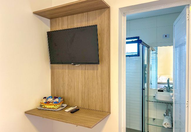 Apartamento en Bertioga - Incrível flat a beira mar na Praia de Guaratuba/SP Apartamento en Bertioga - Incrível flat a beira mar na Praia de Guaratuba/SP