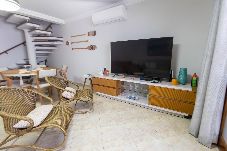Casa en Guarujá - Casa em condomínio com piscina, Wi-Fi e garagem