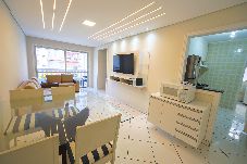 Apartamento en Guarujá - Apto com Wi-Fi, ar-condicionado e vaga de garagem