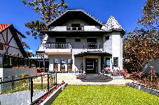 Casa en Campos do Jordão - Casa com 4 Suítes, Jacuzzi e Lareira Externa