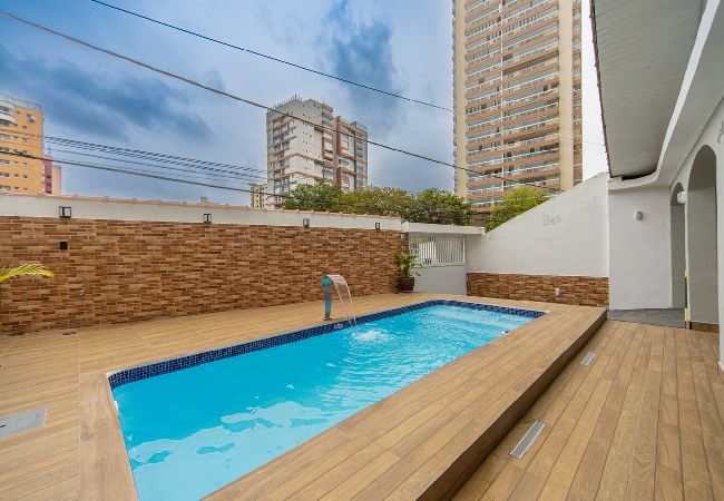 Casa en Praia Grande - Casa com Piscina e Churrasqueira a 220 m da Praia
