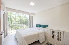 Apartamento en Gramado - Amplo AP térreo 4 suítes a 600m da Rua Coberta